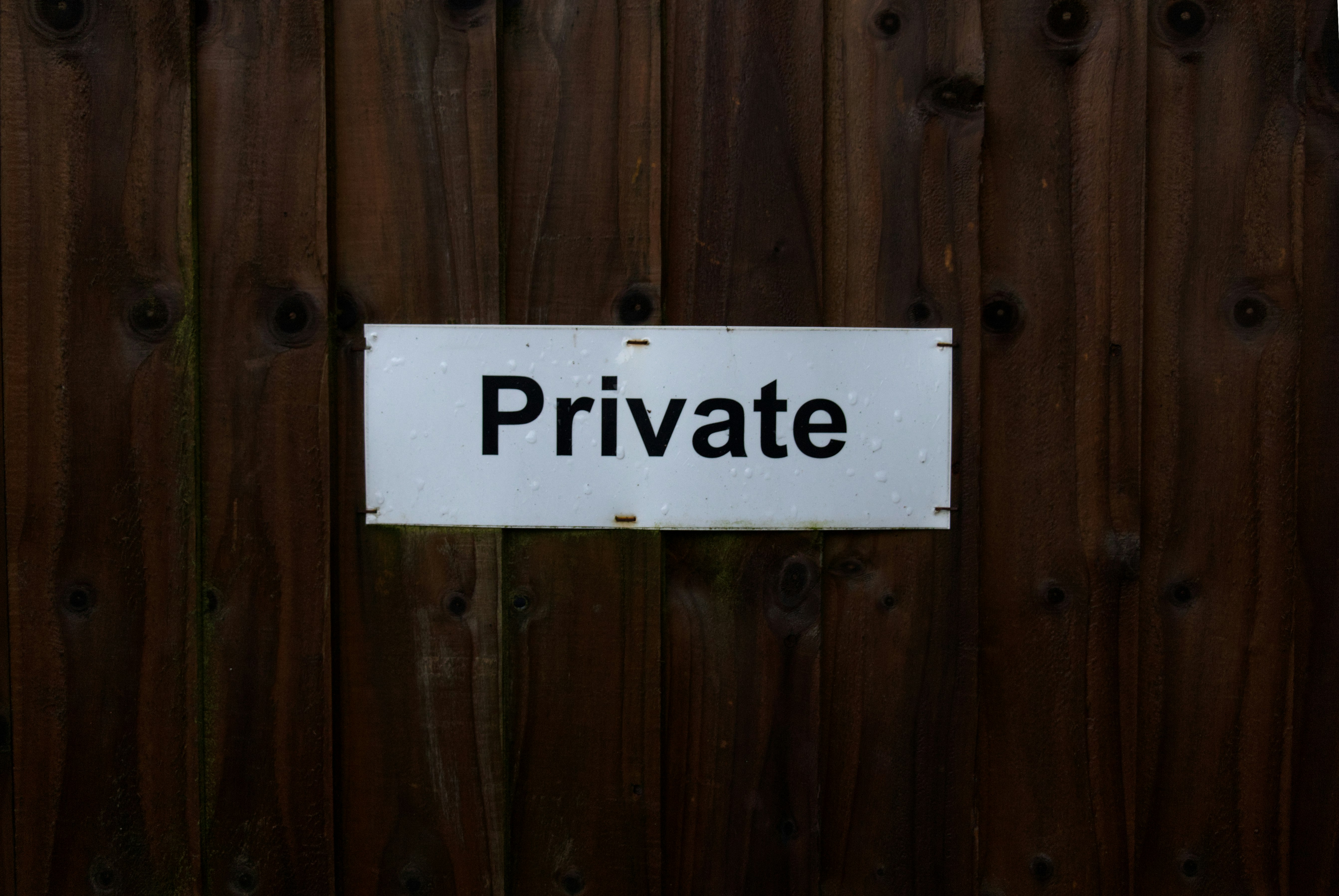 white and black wooden number sign